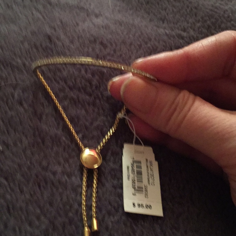 M Kors diamond like bracelet. Sparkles, flowy,